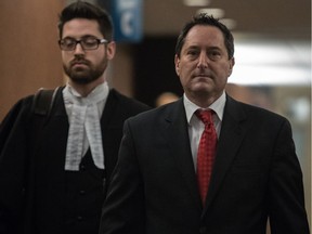 Michael Applebaum leaves courtroom after being found guilty of eight of 14 charges at the Montreal courthouse on Thursday, Jan. 26, 2017.