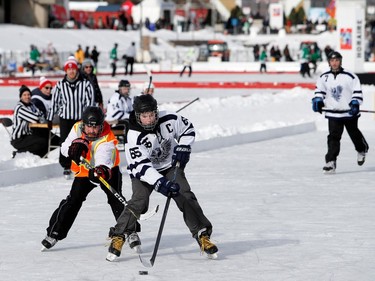 The Phoenix and the Commission Charbonneau, left, take part in the Classique Montrealaise outdoor hockey tournament on Sunday, Jan. 29, 2017, on the Olympic Basin in Jean-Drapeau Park.
