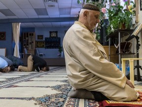 Imam Mehmet Deger praying at the Dorval Mosque on Jan. 30, 2017. The Dorval Mosque has been vandalized nine times since 2008.