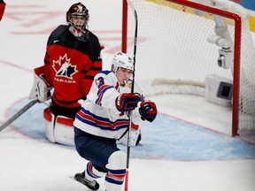Team USA Kieffer Bellows (23) celebrates as Team USA ties the game after scoring their second goal against Team Canada Carter Hart (31) during the gold medal game at the World Junior Championships in Montreal on Thursday January 5, 2017.