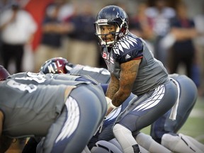 Montreal Alouettes quarterback Vernon Adams Jr. calls signals behind centre during Canadian Football League game against the Hamilton Tiger-Cats in Montreal Friday July 15, 2016. The team The Als' offensive line allowed a CFL-high 64 sacks in 2016.