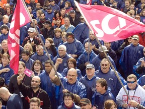 Thousands of Montreal blue-collar workers, joined by blue-collar workers from other regions of Canada rallied outside Montreal city hall Wednesday, October 7, 2009 to protest lagging contract talks with the City.