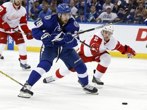 Nikita Nesterov of the Tampa Bay Lightning skates the puck past Brendan Smith of the Detroit Red Wings in Game Seven of the Eastern Conference Quarterfinals during the 2015 NHL Stanley Cup Playoffs at Amalie Arena on April 29, 2015 in Tampa, Fla. Nesterov was traded to the Montreal Canadiens on Thursday, Jan. 26, 2017.