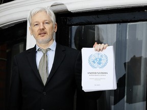 In this Feb. 5, 2016, file photo WikiLeaks founder Julian Assange speaks on the balcony of the Ecuadorean Embassy in London.