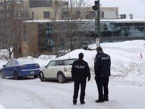 Police attend the scene of a shooting at a Quebec City mosque on Monday January 30, 2017. A shooting at a Quebec City mosque left six people dead and eight others injured Sunday.
