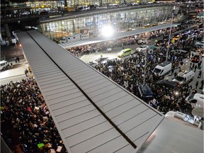 Protestors rally during a demonstration against the new immigration ban issued by President Donald Trump at John F. Kennedy International Airport on January 28, 2017 in New York City. President Trump signed the controversial executive order that halted refugees and residents from predominantly Muslim countries from entering the United States.