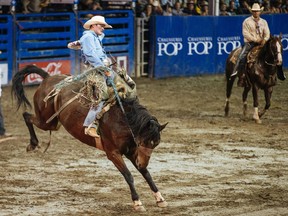 Brent Foster competes in the night's rodeo at the Saint-Tite Western Festival near Montreal, Sept. 16, 2015.