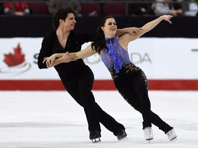 Tessa Virtue and Scott Moir compete in the senior ice-dance short dance during the National Skating Championships in Ottawa on Friday, Jan. 20, 2017.