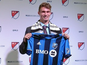 University of California, Santa Barbara forward Nick dePuy poses after being selected 19th overall by the Montreal Impact at the MLS SuperDraft in Los Angeles on Friday, Jan. 13, 2017.