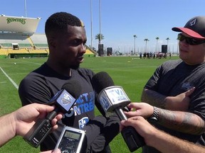 Montreal Impact fullback Ambroise Oyongo, back in camp after helping Cameroon win the Africa Cup of Nations, talks to media at the Montreal Impact&#039;s training camp in St.Petersburg, Fla., Monday, Feb.20, 2017. THE CANADIAN PRESS/Neil Davidson