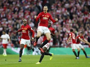 United&#039;s Zlatan Ibrahimovic celebrates after scoring the opening goal during the English League Cup final soccer match between Manchester United and Southampton FC at Wembley stadium in London, Sunday, Feb. 26, 2017. (AP Photo/Kirsty Wigglesworth)