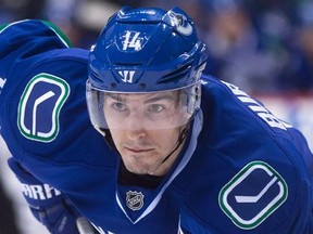 Vancouver Canucks&#039; Alex Burrows lines up during a faceoff during the second period of an NHL hockey game against the Philadelphia Flyers in Vancouver, B.C., on Sunday February 19, 2017. The Ottawa Senators have acquired forward Burrows from the Vancouver Canucks for prospect Jonathan Dahlen. THE CANADIAN PRESS/Darryl Dyck