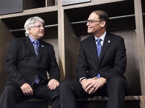 New Toronto Argonauts head coach Marc Trestman, right, and new general manager Jim Popp pose for a photo ahead of a press conference to announce their hirings in Toronto on Tuesday, February 28, 2017. THE CANADIAN PRESS/Frank Gunn