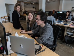 Temps Libre co-founders Gaelle Généreux, executive director, and Vincent Chapdelaine, president, chat with coordinator Ariane Careau, left, at the Montreal offices, on Thursday, Jan. 19, 2017.