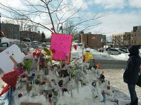People place messages and flowers near a mosque that was the location of a shooting spree in Quebec City, Quebec on January 31, 2017. Alexandre Bissonnette cut a low profile as a shy, withdrawn political science student, keen on far-right ideas. The Canadian political science student known to have nationalist sympathies was charged January 30, 2017 with six counts of murder over a shooting spree at a Quebec mosque -- one of the worst attacks ever to target Muslims in a western country.Prime Minister Justin Trudeau condemned as a "terrorist attack" Sunday night's assault on the Islamic Cultural Center in a busy district of Quebec City, which sent terrified worshippers fleeing barefoot in the snow. /