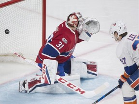 Canadiens goaltender Carey Price is scored on by New York Islanders' Anders Lee in Montreal on Feb. 23, 2017.