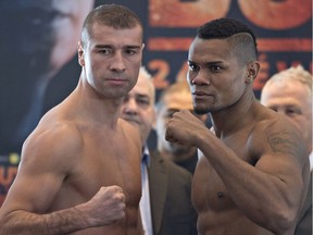 Montreal-based Eleider "Storm" Alvarez, right, and Laval-based Lucian Bute, left, face-off at the weigh-in for a light heavyweight fight, Thursday, February 23, 2017 in Quebec City.