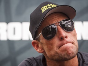 This April 1, 2012 file photo shows Lance Armstrong during a news conference in Galveston, Texas. A federal judge ruled Monday, Feb. 13, 2017 that the government's $100 million lawsuit against Lance Armstrong can proceed.