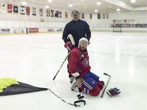 Former NHLer Sergei Berezin, top, with Canadiens defenceman Andrei Markov during a training session in summer 2016 at Glacier Ice Arena in Pompano Beach, Fla.
