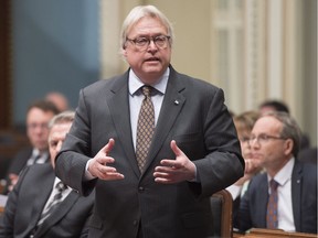 Quebec Health Minister Gaetan Barrette responds to the Opposition during question period, Tuesday, February 7, 2017 at the legislature in Quebec City.