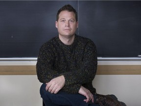 Jason Carmichael, an associate professor in the department of sociology at McGill University poses in his office in Montreal, Thursday, February 23, 2017. During the summers of 2015 and 2016 McGill University professor Jason Carmichael tried to study what factors influenced sentencing outcomes for people convicted of drunk driving, but he ran into a problem.