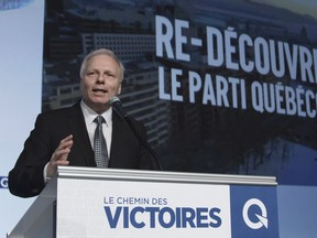 PQ Leader Jean-Francois Lisee gestures during his opening speech at the first day of the Parti Quebecois national council meeting in Quebec City on Saturday, January 14, 2017.
