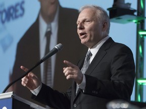 PQ Leader Jean-François Lisée gestures during his opening speech at the first day of the Parti Québécois national council meeting in Quebec City on Saturday, Jan. 14, 2017.