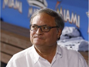 In this May 31, 2016, file photo, Miami Marlins owner and CEO Jeffrey Loria walks through the dugout after a baseball game between the Marlins and the Pittsburgh Pirates, in Miami.