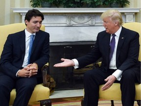 Prime Minister Justin Trudeau meets with U.S. President Donald Trump in the Oval Office of the White House, in Washington, D.C., on Monday, Feb. 13, 2017.