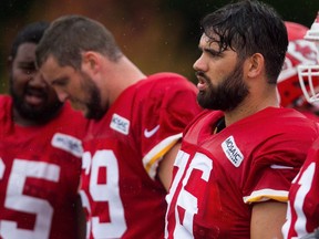 Med student Laurent Duvernay-Tardif, right, said learning to rebound and move on from tough cases in the emergency room has also helped him move on from loses on the field, such as the Kansas City Chiefs' heart-breaking 18-16 AFC divisional playoff defeat last year.