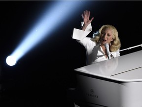 Lady Gaga performs "Til It Happens To You" that is nominated for best original song from "The Hunting Ground" at the Oscars on Sunday, Feb. 28, 2016, at the Dolby Theatre in Los Angeles.