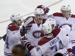 Montreal Canadiens celebrate one of two third-period goals by left wing Max Pacioretty.