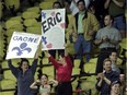 Eric Gagné of the Los Angeles Dodgers had many fans in the stands as he took the mound to pitch against the Montreal Expos in 2001. Two fans hold up signs proclaiming their support for the Quebec born pitcher.