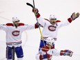 Montreal Canadiens' Phillip Danault (24), captain Max Pacioretty and defenceman Andrei Markov celebrate a goal by Alexander Radulov against the Arizona Coyotes during the third period Thursday, Feb. 9, 2017, in Glendale, Ariz.