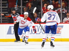 Max Pacioretty of the Montreal Canadiens celebrates the game winning power play goal by Alex Galchenyuk at 2:54 of overtime against the New Jersey Devils at the Prudential Center on Feb. 27.