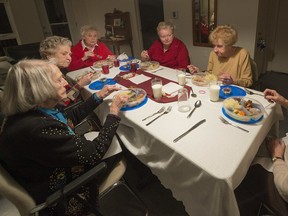 Seniors meet for dinner at the Villa Beaurepaire in Beaconsfield on Dec.7, 2013.