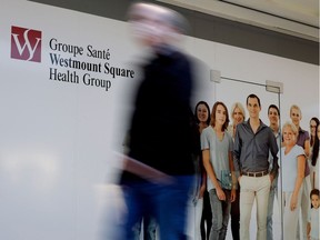 A man walks past one of the Westmount Square Medical Group offices in Montreal on Friday February 10, 2017.