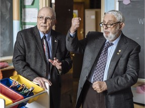 Doctors Phil Gold, left, and Mort Levy, right, inside their Grade 1 classroom at Bancroft School on Montreal on Monday, February 13, 2017. Levy and Gold met outside that classroom nearly 75 years ago, September 8, 1942, the first day of school, and have been friends ever since.