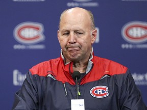 Coach Claude Julien ponders a question while meeting the media after his first practice after replacing Michel Therrien as coach of the Canadiens at the Bell Sports Complex in Brossard on Friday, Feb. 17, 2017.