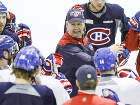 Claude Julien speaks to players at his first practice after replacing Michel Therrien as coach of the Montreal Canadiens at the Bell Sports Complex in Brossard on Friday, Feb. 17, 2017.