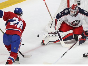 Montreal Canadiens' Jeff Petry (26) watches puck slide past Columbus Blue Jackets goalie Sergei Bobrovsky, while Alexander Wennberg (10) comes in on the play, during first period NHL action in Montreal on Tuesday Feb. 28, 2017.