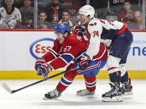 Canadiens' Max Pacioretty is chased down by Washington Capitals' John Carlson in Montreal on Saturday, Feb. 4, 2017.