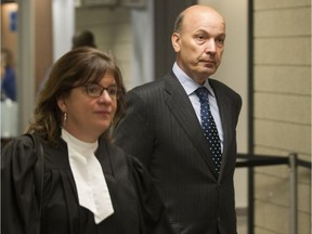 Former Montreal executive committee chairman Frank Zampino, right, leaves a Montreal courtroom with his lawyer Isabel Schurman, Friday June 17, 2016, after failing to have proceedings against him stayed.