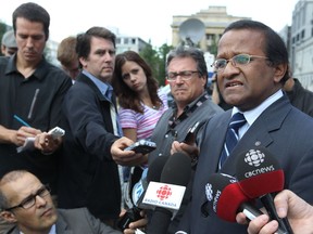 St-Laurent borough mayor Alan DeSousa speaks with the press in 2013.