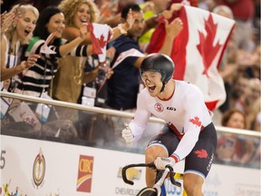 Hugo Barrette of Canada celebrates his win in the men's cycling sprint finals at the 2015 Pan American Games in Toronto, Canada, July 18,  2015.