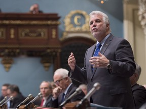 Quebec Premier Philippe Couillard responds to the Opposition during question period Thursday, December 8, 2016 at the legislature in Quebec City.