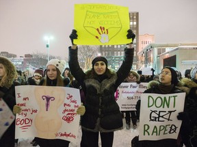 MONTREAL, QUEBEC, FEBRUARY 15, 2017: Protesters hold up signs in support of sexual assault survivors during a demonstration against rape culture in Place Emilie Gamelin, Montreal, Wednesday, February 15, 2017.  (Graham Hughes/Montreal Gazette) ORG XMIT: 58124