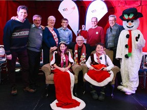 The 2017 Dorval Winter Festival Queen Addy Richer and King Ethan Zack hold court with city councillors and Mayor Edgar Rouleau (crouching).