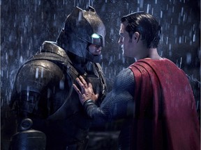 This image released by Warner Bros. Pictures shows Ben Affleck, left, and Henry Cavill in a scene from, "Batman v Superman: Dawn of Justice."