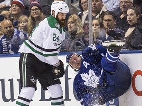 Toronto Maple Leafs centre Leo Komarov (47) gets nailed by Dallas Stars defenceman Jordie Benn (24)  in Toronto on Tuesday February 7, 2017. Benn was traded to the Montreal Canadiens on Monday, Feb. 27, 2017.